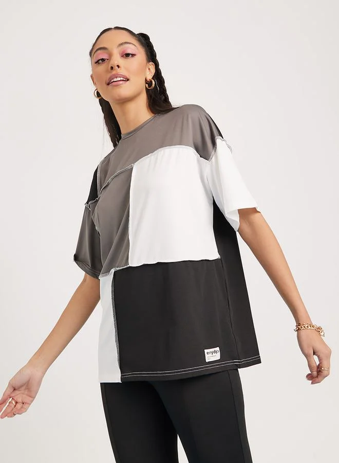 Styli Color Block Oversized Fit T-Shirt and Fitted Leggings Set