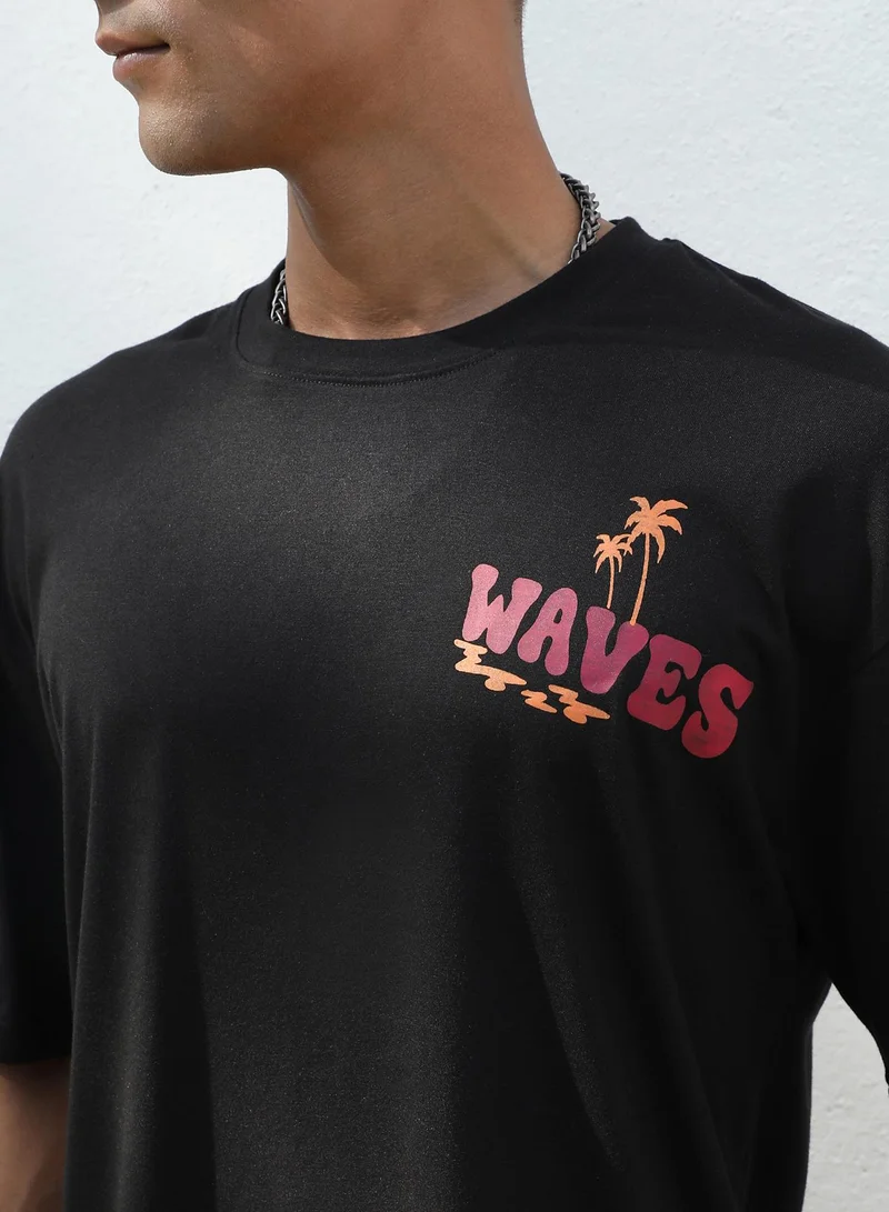 Campus Sutra Men's Black Relaxed Co-Ord Set With Graphic Print