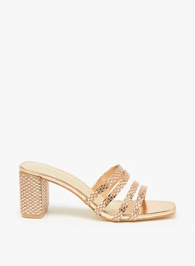 فلورا بيلا من شو إكسبرس Women's Embellished Slip-On Sandals With Block Heels