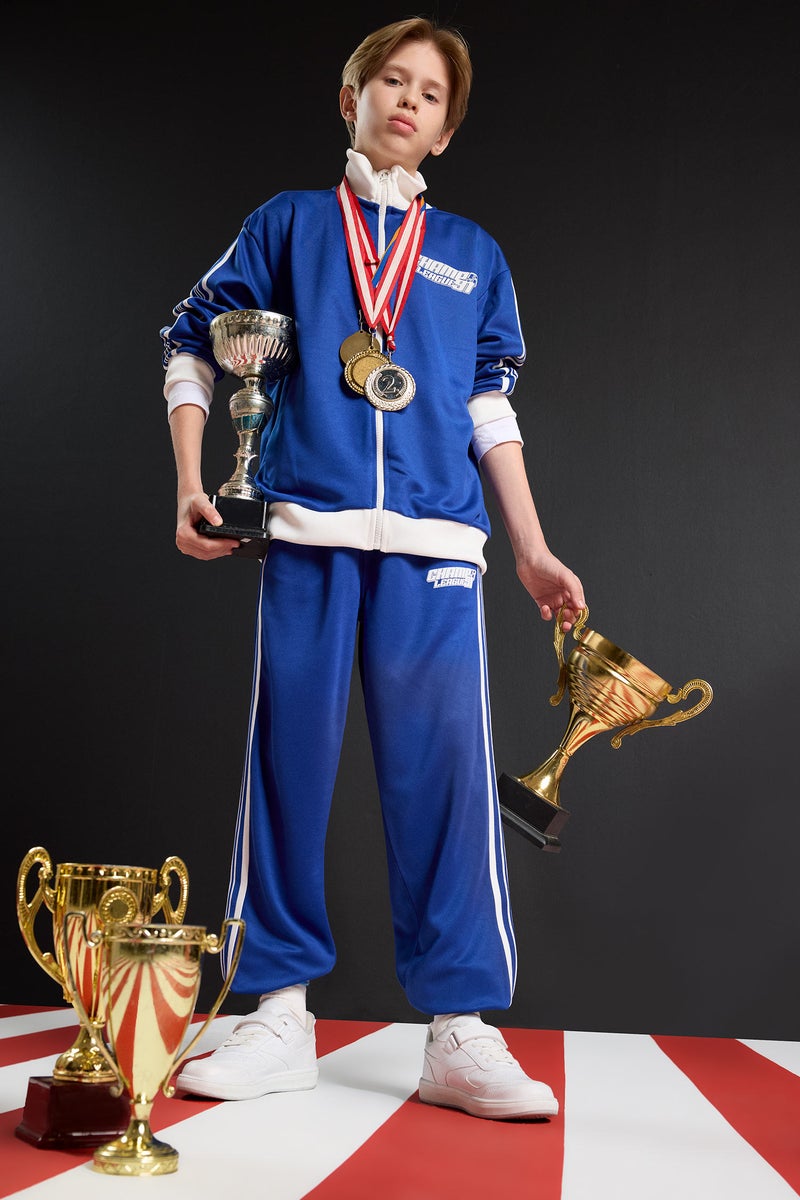 ديفاكتو بنطلون سويت بانتس جوجر اولادي قصة عادية وخصر مطاطي أزرق فاقع - Image 1