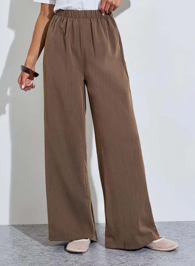 ستايلي Brown Solid Wide Leg Pants