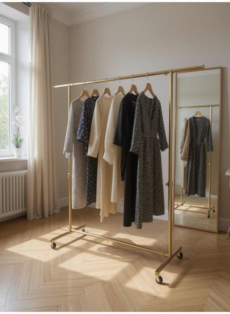 Living Iron clothes rack with movable wheels, golden color - Image 1