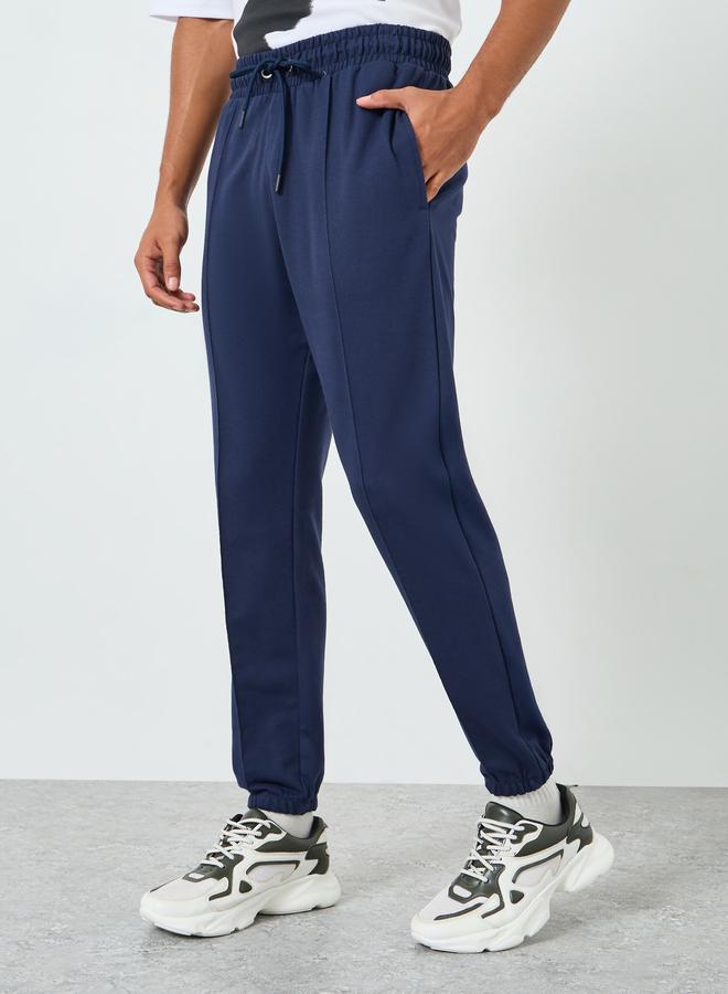 ستايلي بنطال جوغر سادة مع تفاصيل محزوزة - Image 1