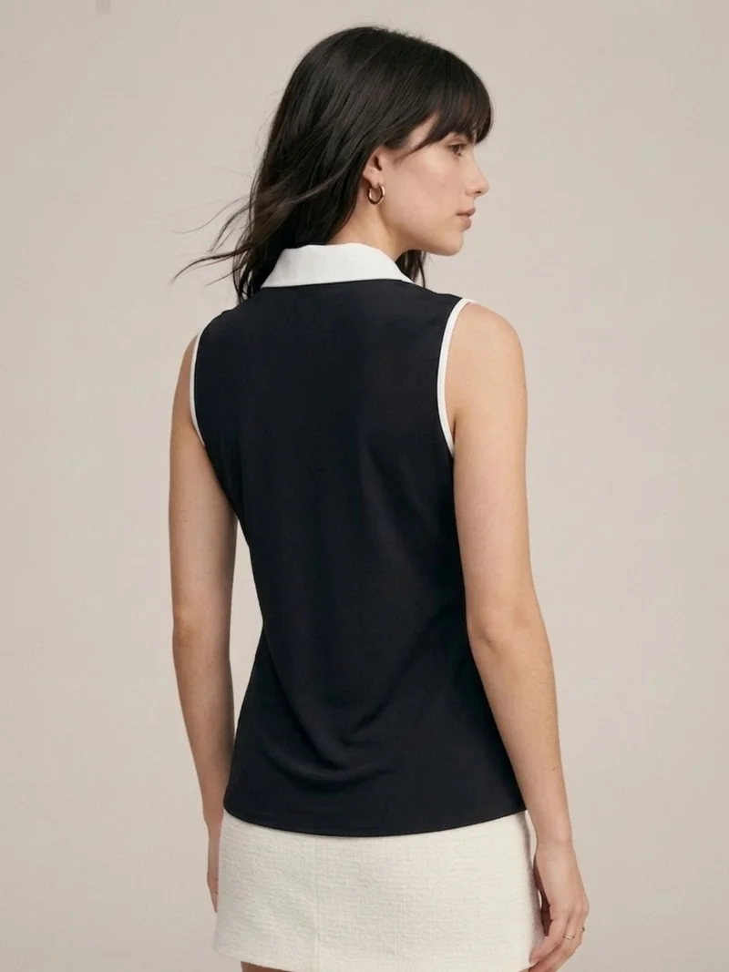 Outzidr  Black Sophisticated Black Sleeveless Shirt for Women | Best Price UAE
