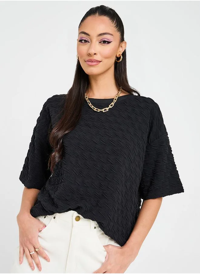 ستايلي Textured Round Neck Oversized Top