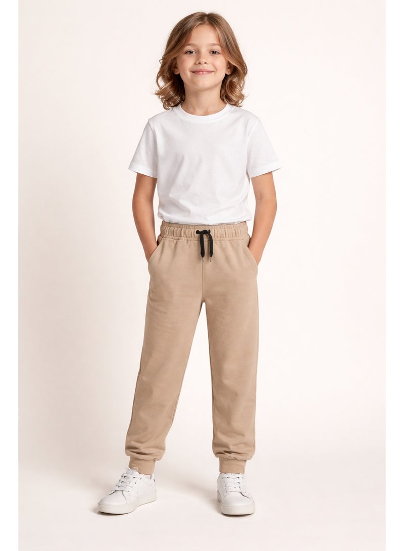 شي إن بنطلون جوجر أطفال لون بيج مناسب للبنات والأولاد، بخصر استك ورباط لراحة وثبات أفضل، خامة ناعمة ومريحة، مثالي للبس اليومي والخروج والكاجوال. - Image 2