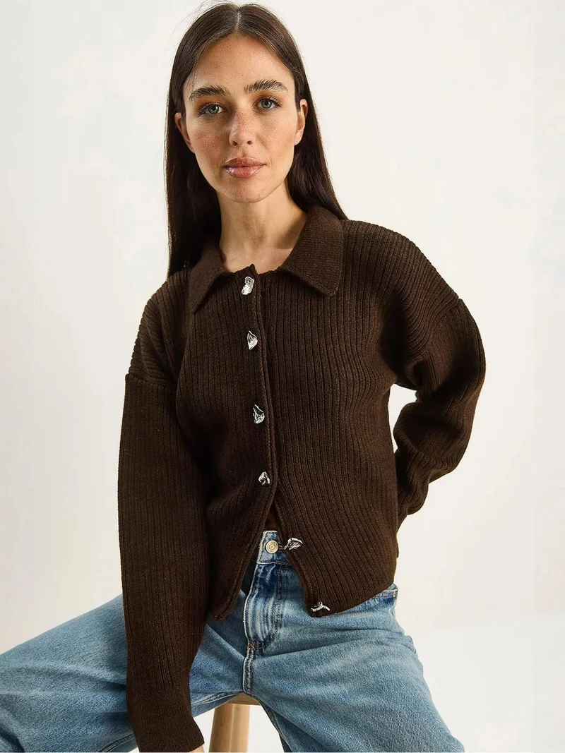 بيانكو لوتشي كارديجان لوكسي محبوك بأزرار