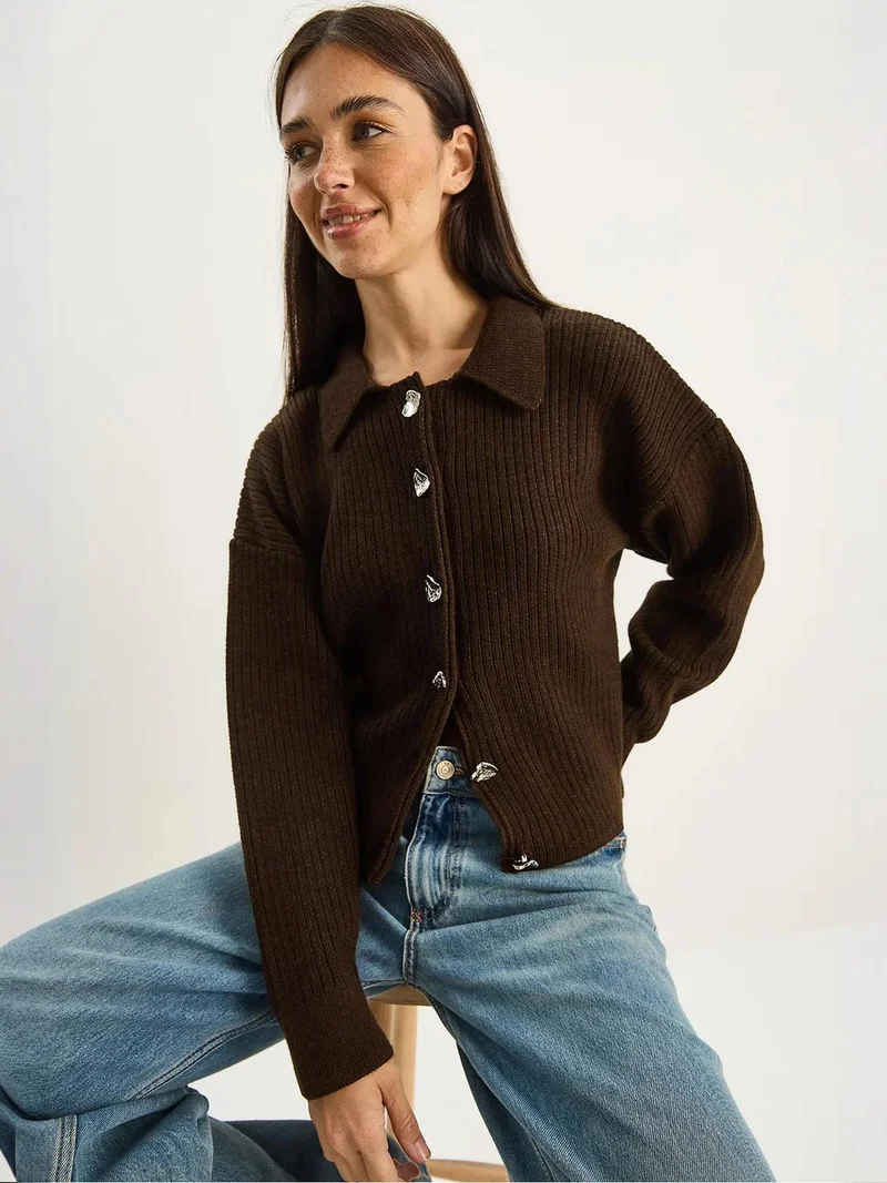 بيانكو لوتشي كارديجان لوكسي محبوك بأزرار