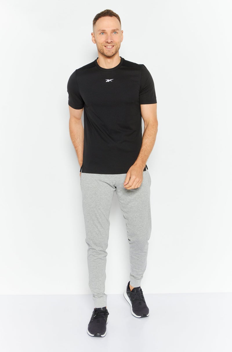 Reebok تي شيرت تدريب قصير الأكمام للرجال، رياضي، أسود - Image 2