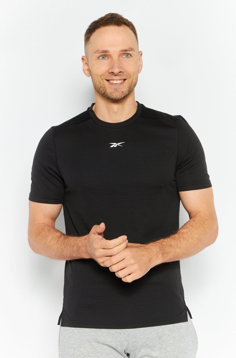 Reebok تي شيرت تدريب قصير الأكمام للرجال، رياضي، أسود - Image 1