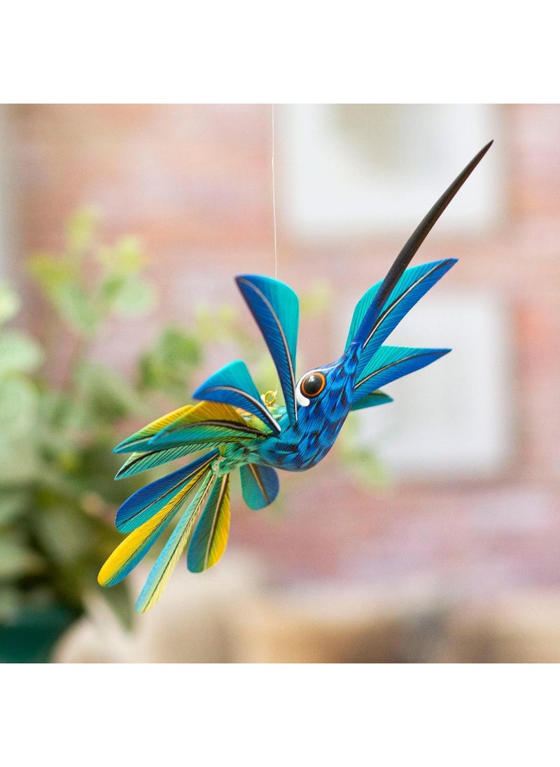 NOVICA NOVICA Blue and Yellow Hand Painted Alebrije Hummingbird Copal Wood Sculpture Blue Hummingbird  - Image 2