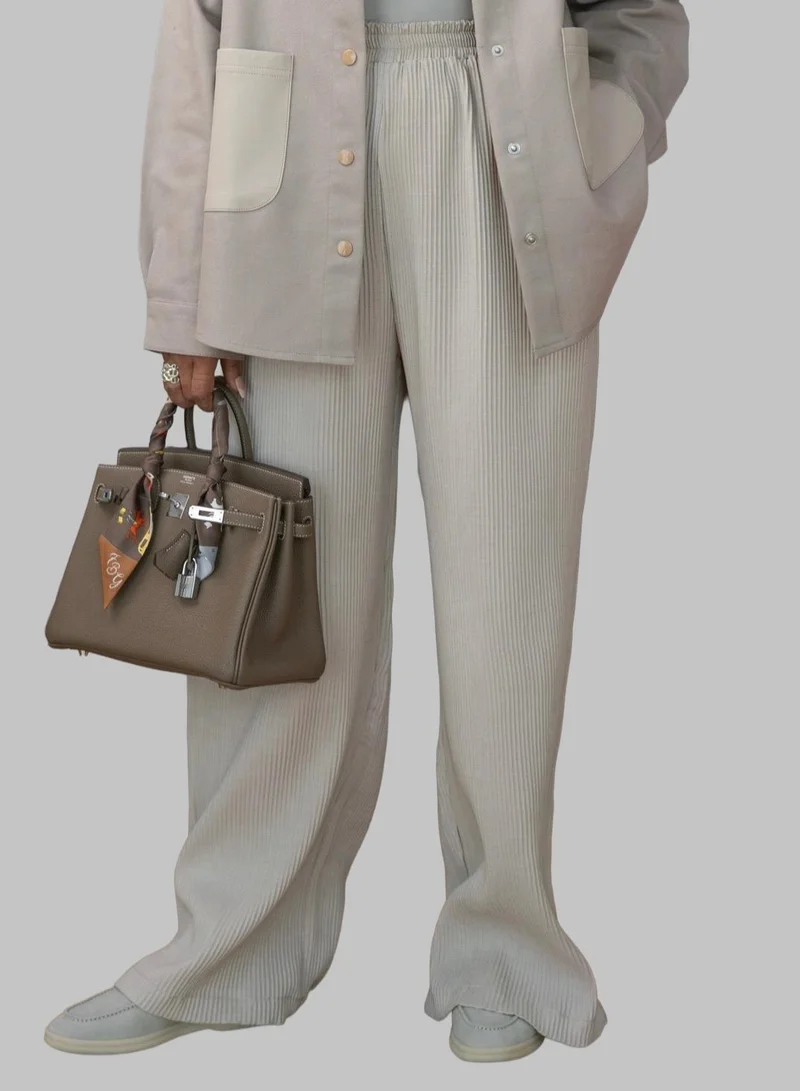 بوند بنطال واسع بيج بقصة خصر عالي من قماش لينن