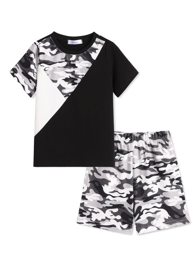 Arshiner أزياء صيفية للأولاد الصغار من أرشينر تي شيرت قصير الأكمام وشورتات مرنة لمجموعة ملابس غير رسمية من قطعتين باللون الأسود المموه 6-7 سنوات - Image 1