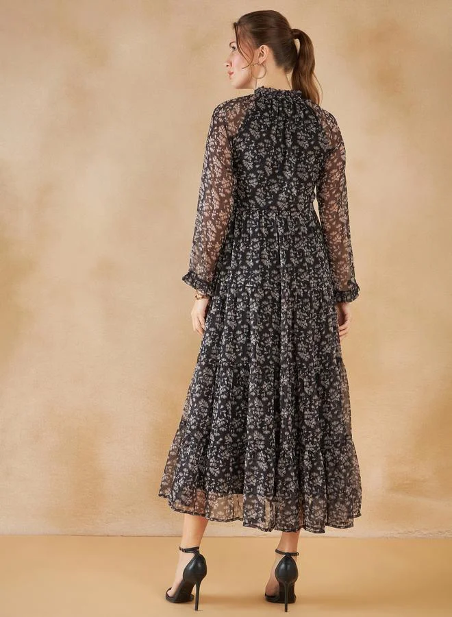 فيميلا Floral Print Tie Up Neck Tiered Maxi Dress by Styli
