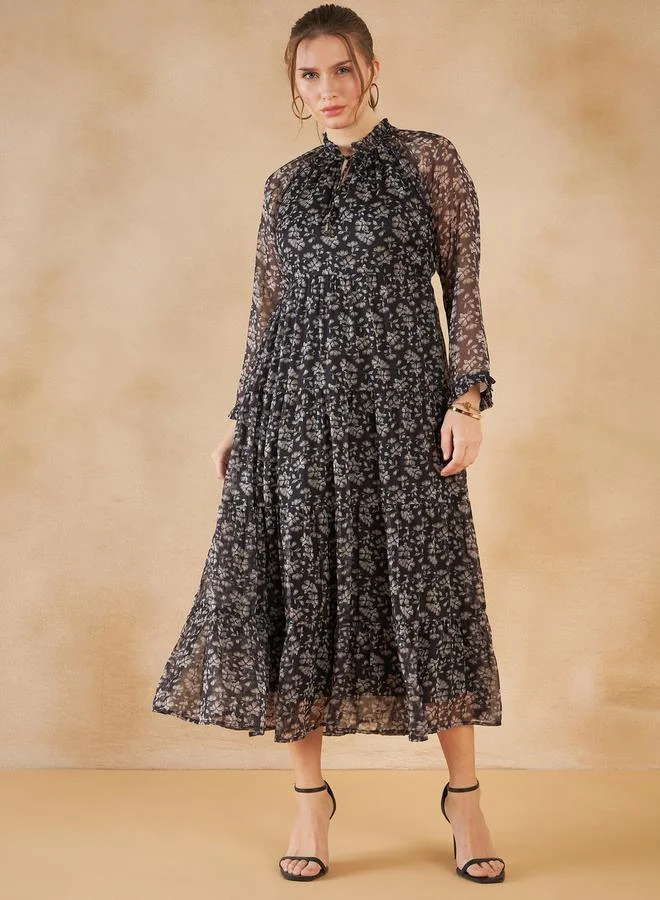 فيميلا Floral Print Tie Up Neck Tiered Maxi Dress by Styli