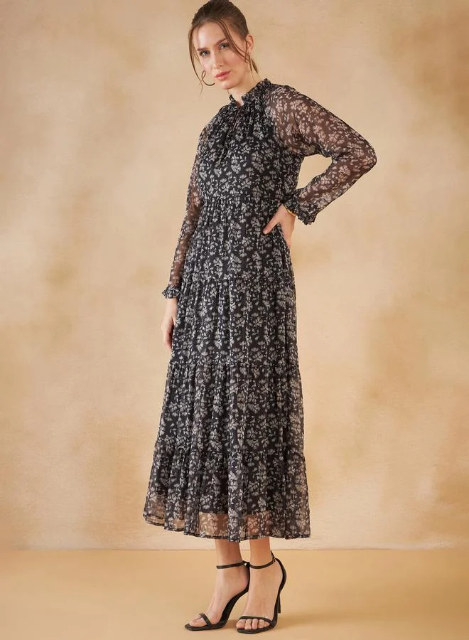 فيميلا Floral Print Tie Up Neck Tiered Maxi Dress by Styli