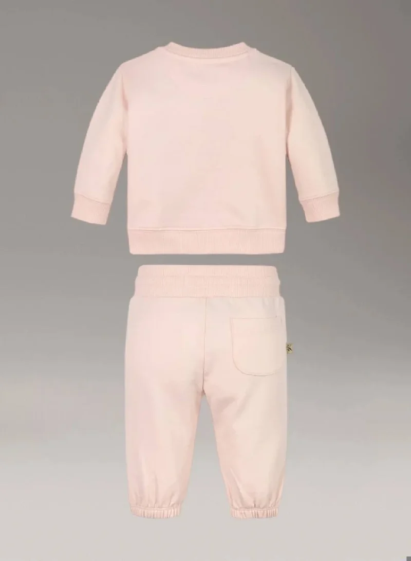 كالفن كلاين جينز بدلة من قطن التيري بشعار لحديثي الولادة