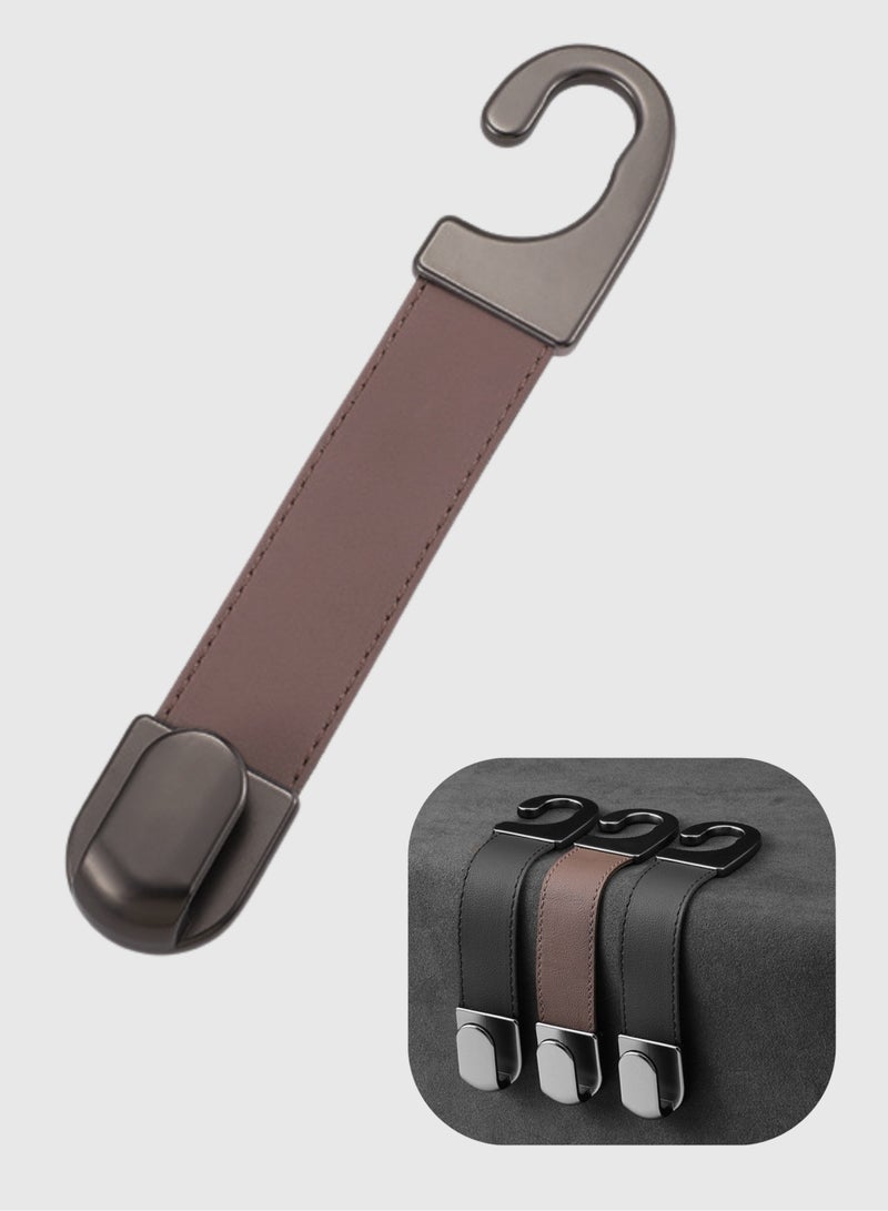 خطافات مقعد السيارة المقوّاة بالمعدن وجلد الكلاسيك – شمّاعة خلفية أنيقة للمحفظة، الشمسية والملابس، قوة تحمّل 20 كغ (جلد كلاسيكي | بني) - Image 1