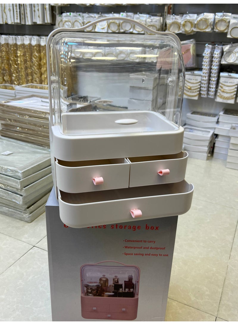 This image shows a dustproof, large capacity makeup organizer with a clear lid and drawers. These types of organizers are typically made from materials like plastic or acrylic and are designed to keep cosmetics and skincare products organized and protected from water and dust. - Image 2