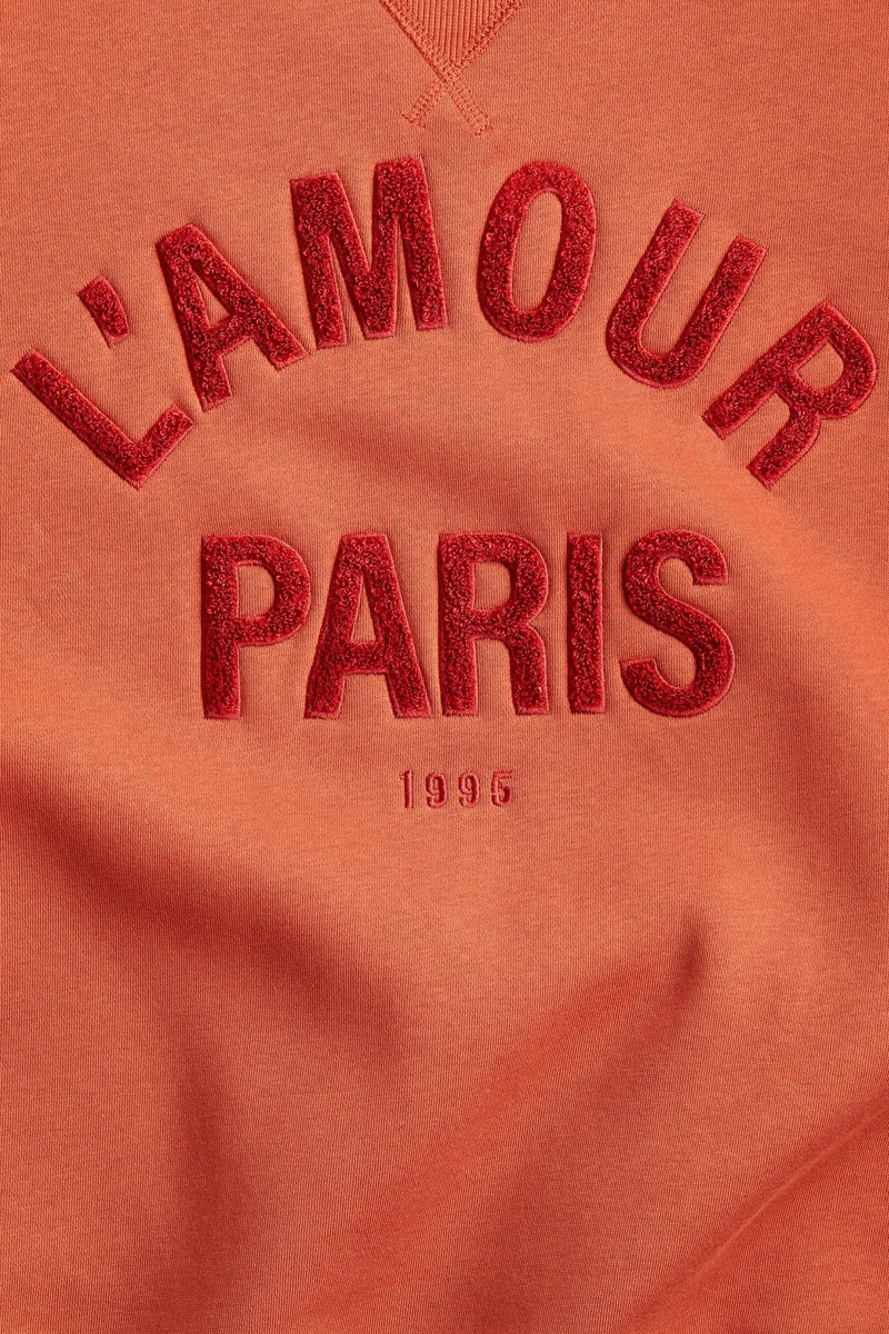 اتش اند ام سويت شيرت مزين بعبارة مطبوعة