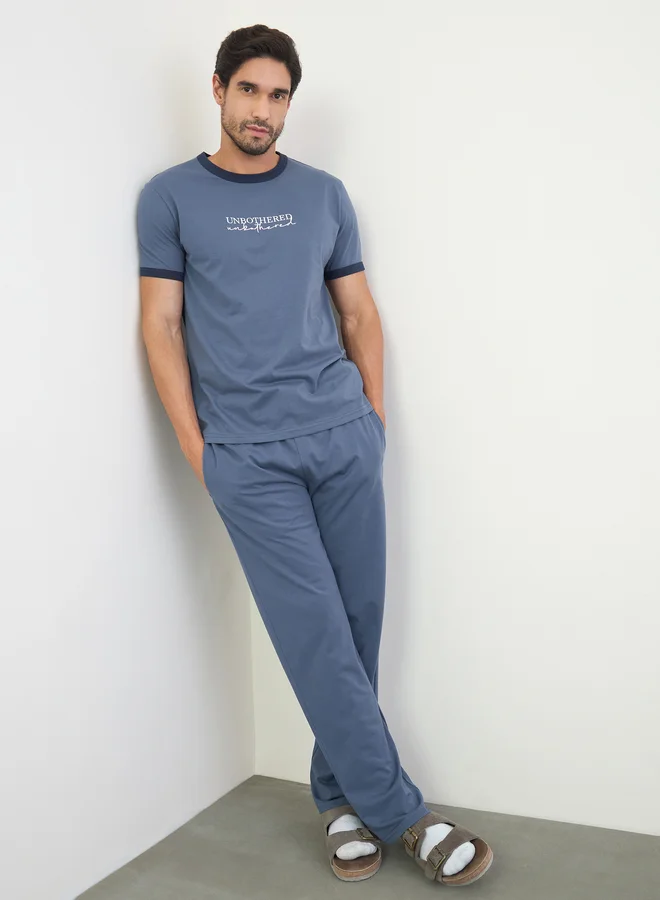 Styli Men Navy Blue Minimal Print T-Shirt and Solid Pyjama Pants Set