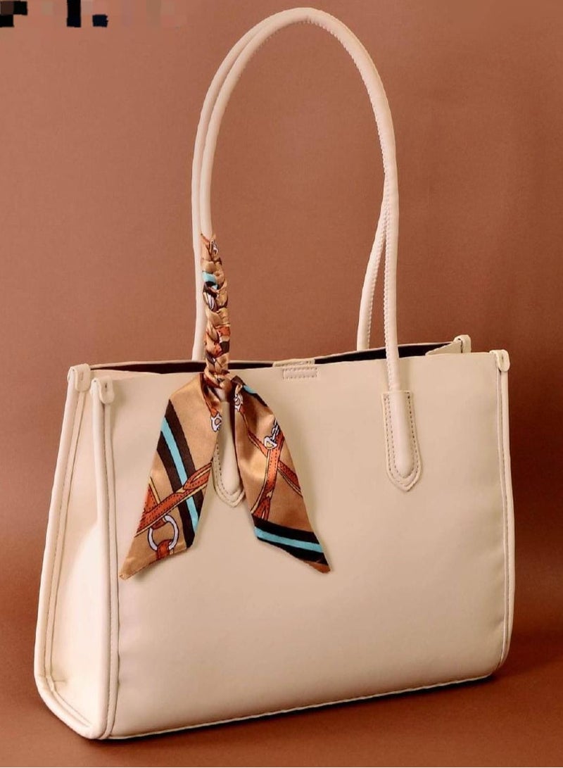 Square women's handbag with distinctive accessory with adjustable handle - Image 1