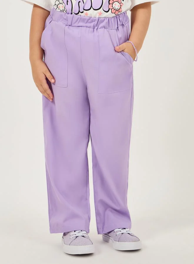 Styli Graphic Print Oversized T-Shirt & Solid Pants Set