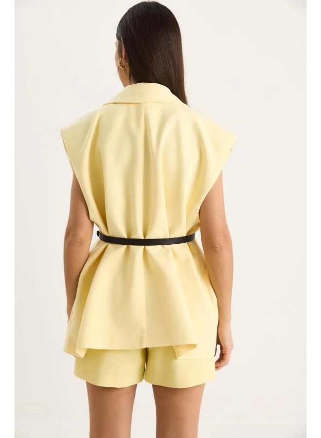 جينجر سترة طويلة مفصلة بحزام