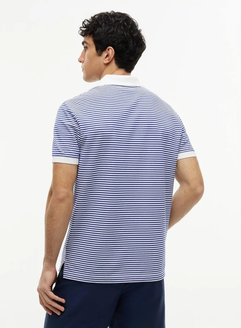 Tommy Hilfiger Pigment Blue / White Performance Regular Fit Pique Polo Shirt for Men | Best Price UAE