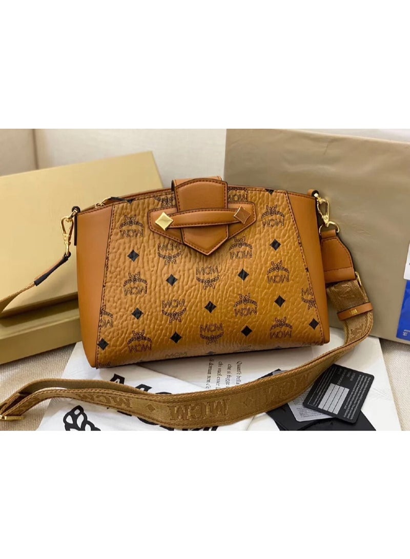 MCM Brown Monogrammed Crossbody Bag with Logo Webbing Strap and Gold-tone Accents