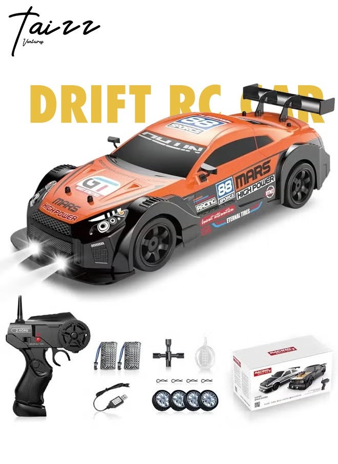 Taizz Ventures 1:16 Scale Remote Control Car RC Drift Car 4WD 18KM/H High Speed Model Vehicle 2.4GHz with LED Lights Spray Rubber Tire Racing Sport Toy Car for Adults Boys Girls Kids Gift 2Pcs Rechargeable Batteries - Orange/Black  - Image 1