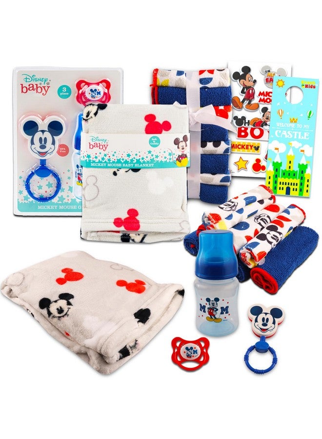 MICKEY MOUSE طقم هدايا بيبي ميكي ماوس من ديزني، هدايا حفلات استقبال المواليد للأولاد محايدة - 12 قطعة من أساسيات حديثي الولادة مع بطانية، مناشف، جرس، زجاجة، مصاصة، ملصقات ألبوم قصاصات، المزيد - Image 1