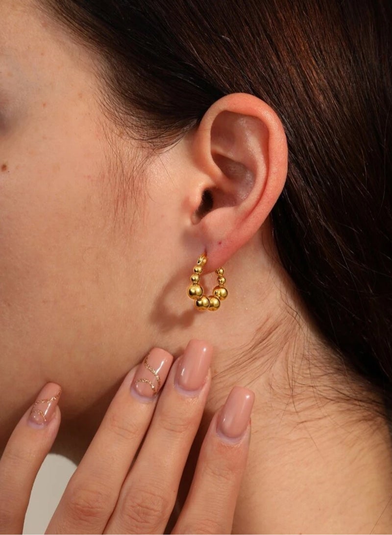 إيكوال حلق اذن نسائي دائري من الاستانلس ستيل أنيق وعالي الجودة باللون الذهبي - Image 1