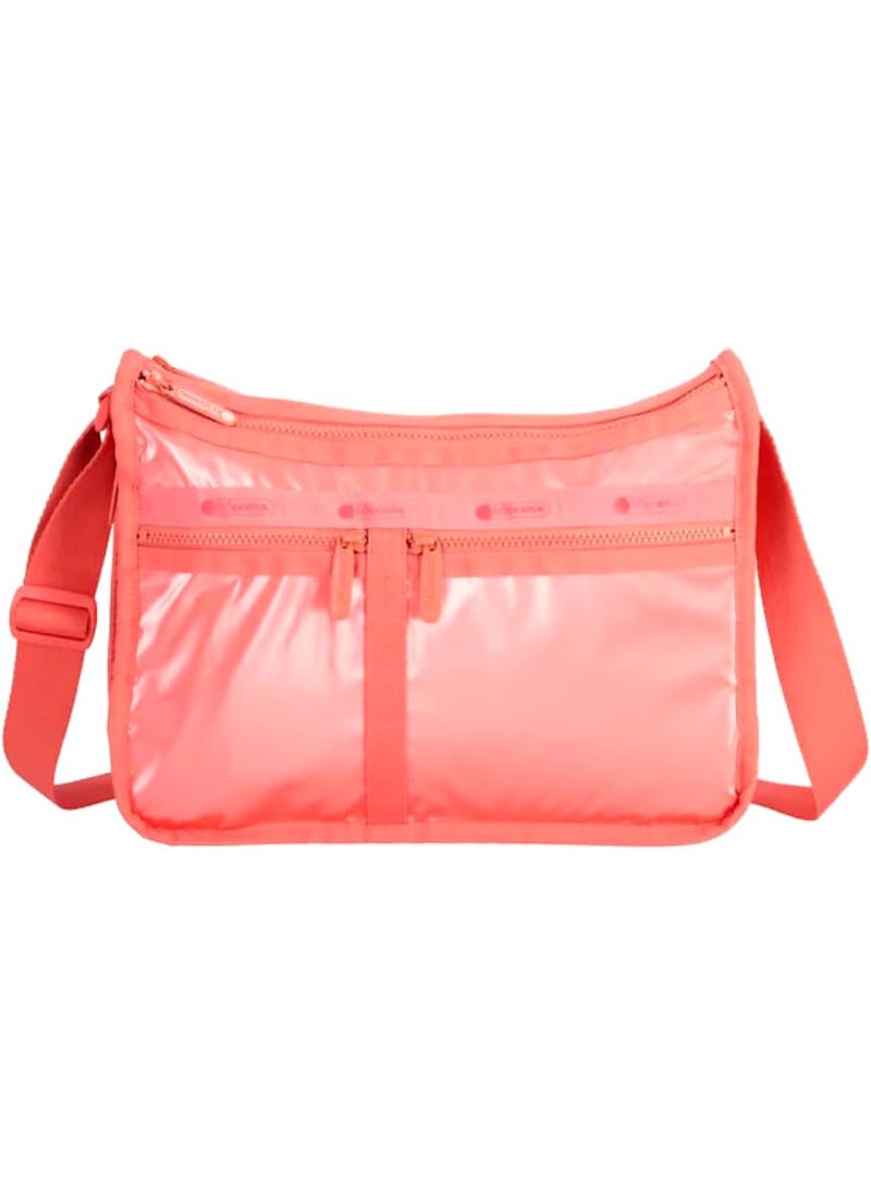 LeSportsac - LeSportsac Coastal Dawn Patent Deluxe Everyday Crossbody Bag + Cosmetic Bag, Style 7507/Color E648, Fashion Trending Peach Glow Specialty Patent, Pearlized Iridescent Matte Shimmer, Modern Wide Zipper - Image 1