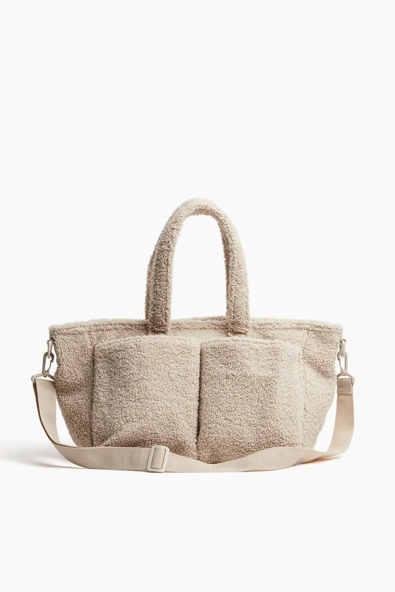H&M Fluffy nursing bag