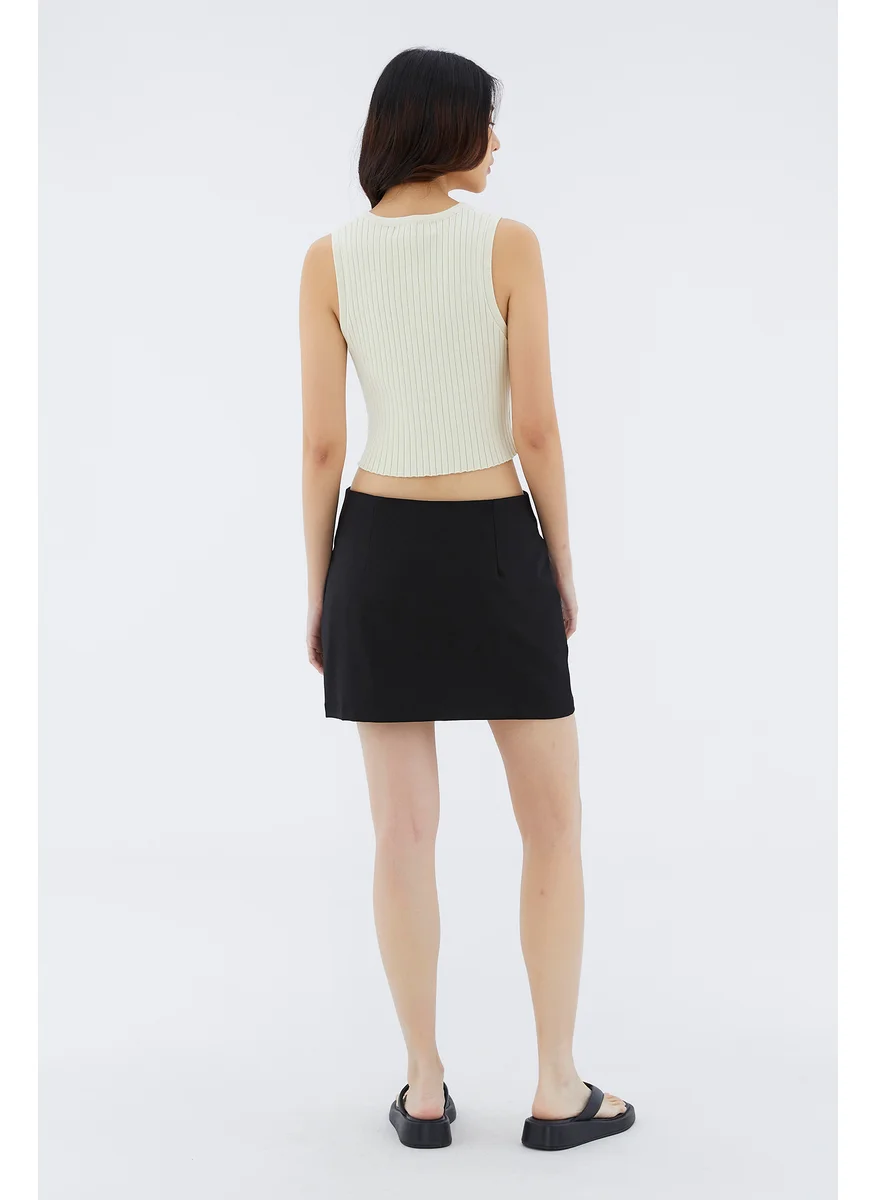 ذا اديتورز ماركت Felane Low-Rise Mini Skirt