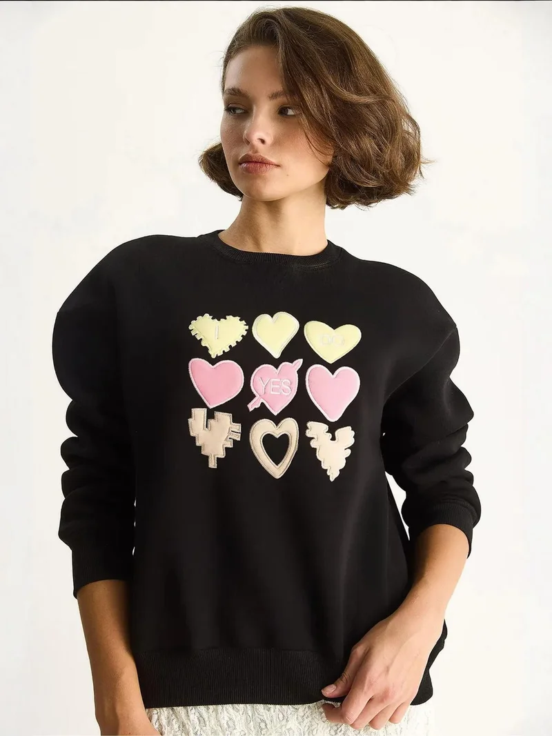 Bianco Lucci Black Heart Patch Appliqué Relaxed Fit Crew Neck Sweatshirt for Women | Best Price UAE
