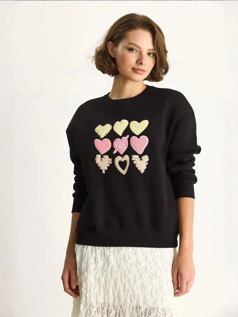 Bianco Lucci Black Heart Patch Appliqué Relaxed Fit Crew Neck Sweatshirt for Women | Best Price UAE
