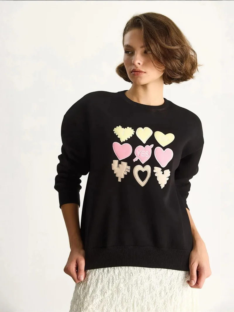 Bianco Lucci Black Heart Patch Appliqué Relaxed Fit Crew Neck Sweatshirt for Women | Best Price UAE