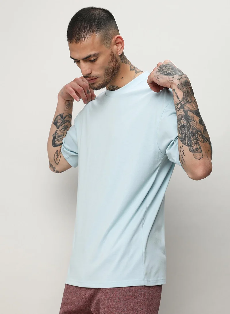 Campus Sutra Campus Sutra Men's Powder Blue Oversized Basic T-Shirt For Casual Wear | Crew Neck | Short Sleeve | Pull On Closure | T-Shirt Crafted With Comfort Fit For Casual Wear