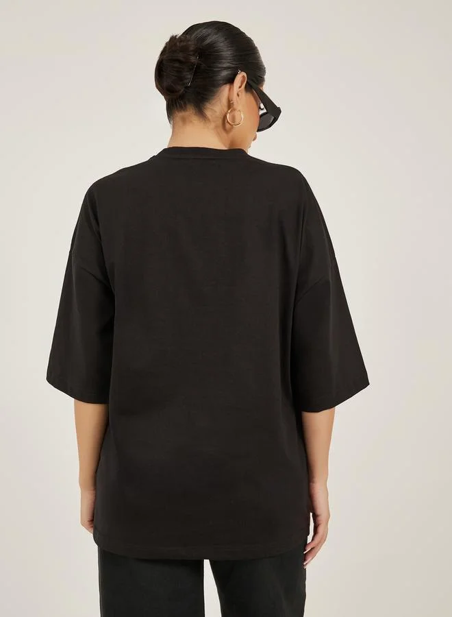 ستايلي Slogan Print Dropped Shoulder Oversized T-Shirt