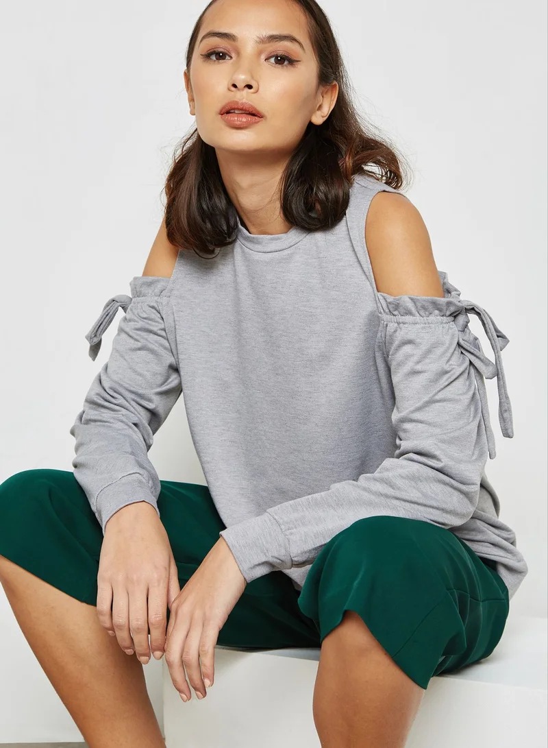 LUMIERE Cold Shoulder Frill Sweater