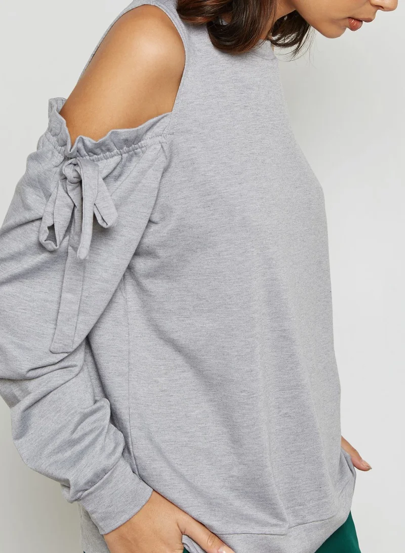 LUMIERE Cold Shoulder Frill Sweater