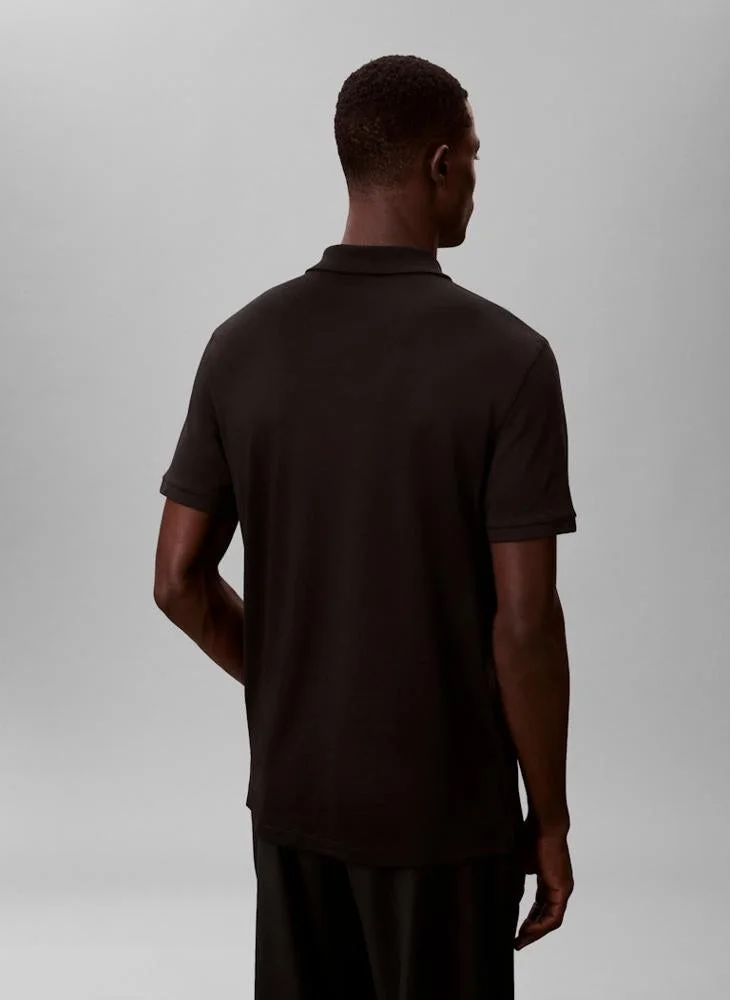 كالفن كلاين قميص بولو بسحاب رفيع