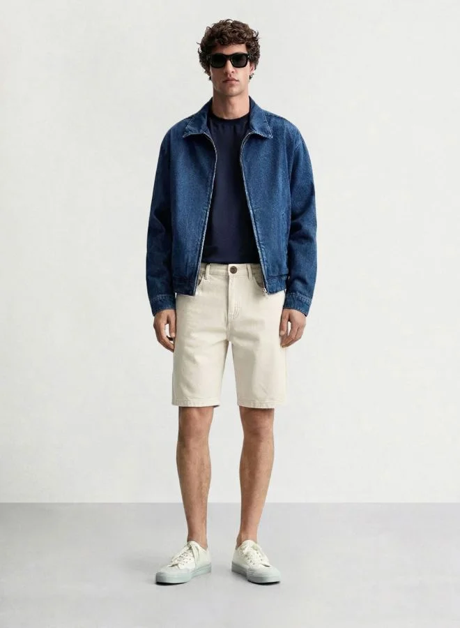 The Indian Garage Co  Men Regular Fit Solid Scoop Pocket Mid-Rise Denim Shorts  | Best Price UAE