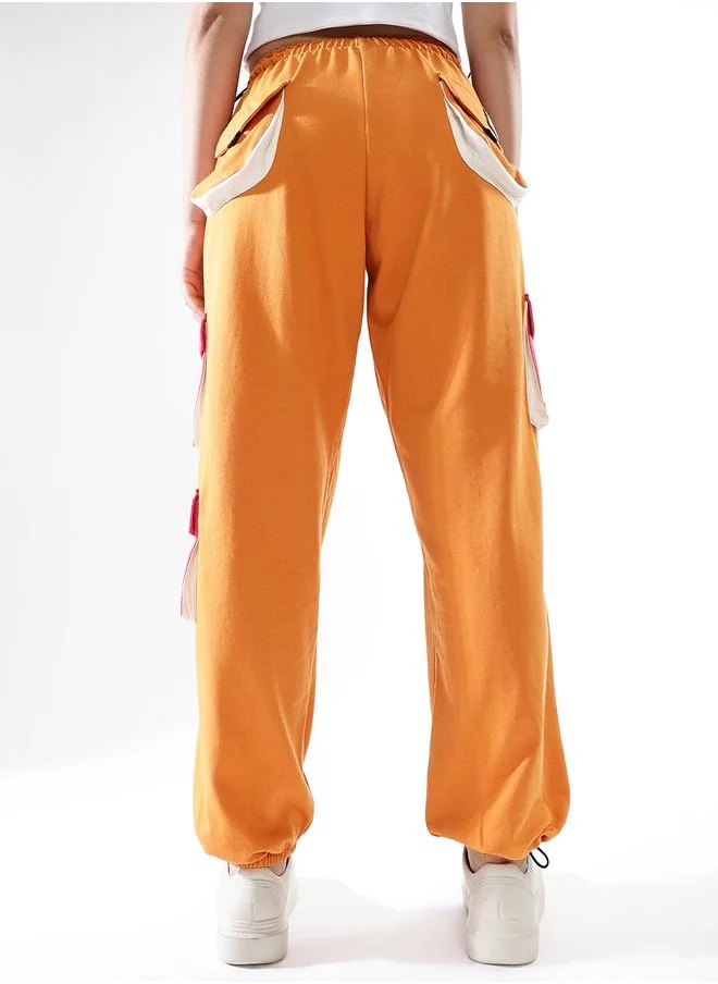 هوبرهولمي Women Track Pants in Multicolor featuring Jogger fit with a printed pattern, no sleeves, regular length, secured with elasicated + drawstring closure, crafted from terry – an essential addition to your stylish collection.