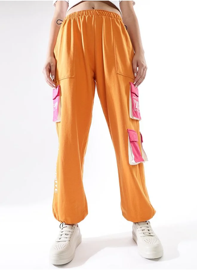 هوبرهولمي Women Track Pants in Multicolor featuring Jogger fit with a printed pattern, no sleeves, regular length, secured with elasicated + drawstring closure, crafted from terry – an essential addition to your stylish collection.