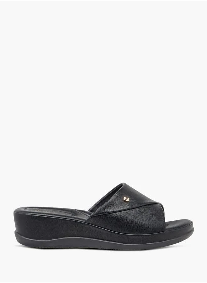 فلورا بيلا من شو إكسبرس Women Monogram Print Slip-On Sandals with Wedge Heels