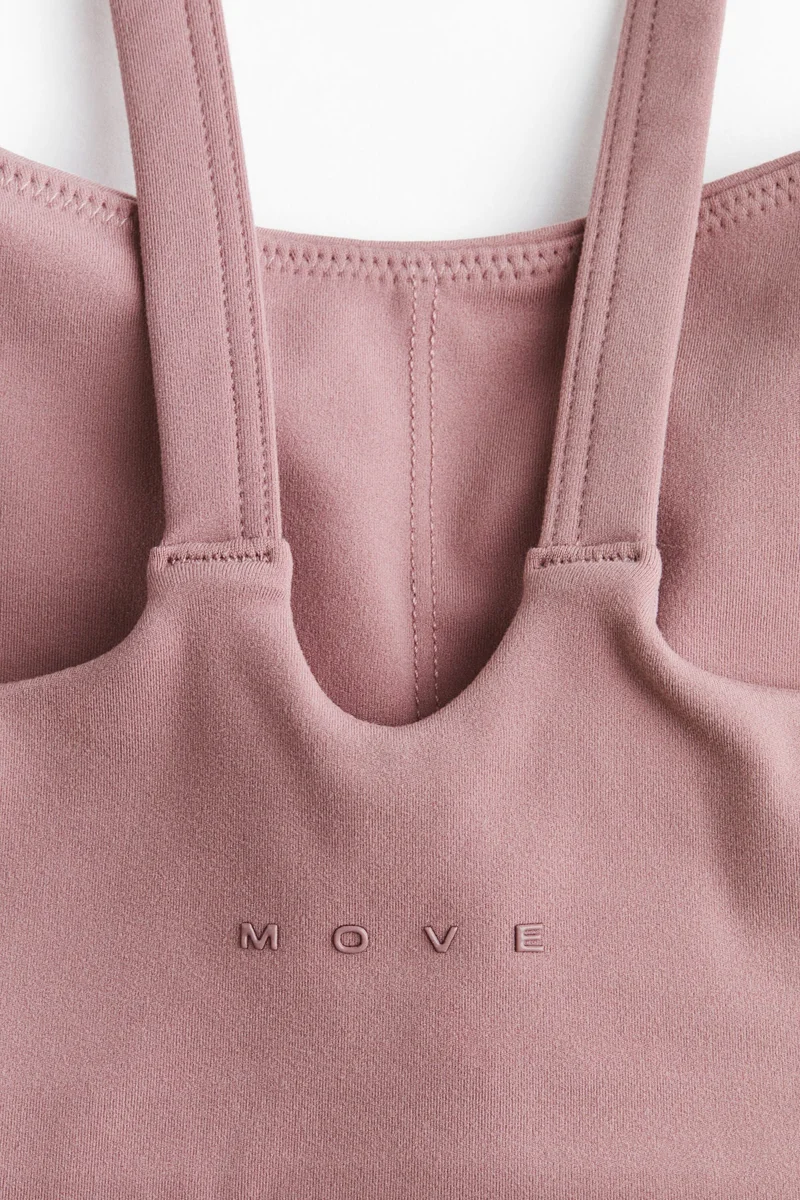 اتش اند ام حمالة صدر رياضية بدعم متوسط من نسيج سوفت موف