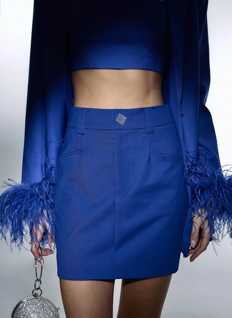 Lichi Mini skirt with accent button